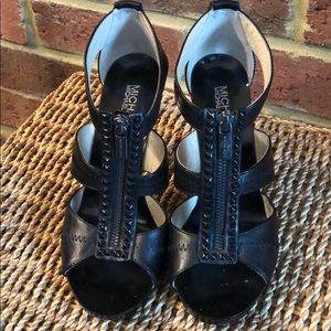 Like new MICHAEL KORS leather black heels.  Sz 7.